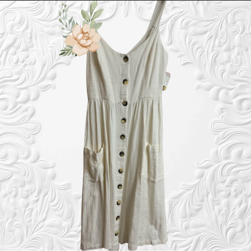 Rip Curl cream/ off white midi dress with pockets . New . Size M